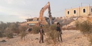 بالصور|| آليات الاحتلال تهدم منزلين للمستوطنين في "يتسهار"