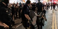 إصابة 60 شرطيا خلال احتجاجات في سياتل الأمريكية