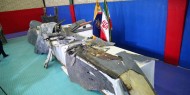 صور|| إيران تنشر صوراً لطائرة أمريكية أسقطها الحرس الثوري