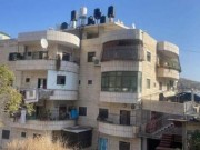 العائلات المتضررة تعتصم ضد قرار الاحتلال هدم بنايتها في سلوان