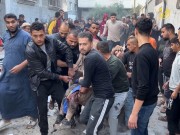 صور|| انتشال شهداء ومصابوب بقصف عائلة قنن في خان يونس